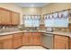 A well-maintained kitchen that features stainless steel appliances and modern cabinetry at 9370 Corkfish St, Las Vegas, NV 89178