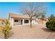Backyard featuring desert landscaping and view of the house at 10309 Georgetown Pl, Las Vegas, NV 89134