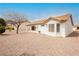 Wide backyard shot with desert landscaping and partial home view at 10309 Georgetown Pl, Las Vegas, NV 89134