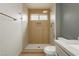 Contemporary bathroom showcases a shower with a wooden-style tile design at 10309 Georgetown Pl, Las Vegas, NV 89134