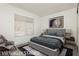 Comfortable bedroom with neutral decor offers a relaxing space with lots of light at 10309 Georgetown Pl, Las Vegas, NV 89134