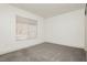 Bedroom featuring plush carpet and a window with natural light at 10309 Georgetown Pl, Las Vegas, NV 89134