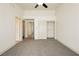 Cozy bedroom with plush carpet, neutral walls, and ample closet space at 10309 Georgetown Pl, Las Vegas, NV 89134