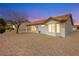 Charming single-story home featuring a tile roof and a well-maintained gravel yard at 10309 Georgetown Pl, Las Vegas, NV 89134