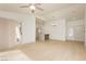 Open-concept living area with light wood floors and direct access to the kitchen area at 10309 Georgetown Pl, Las Vegas, NV 89134