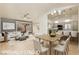 Bright living room boasts an open floor plan, neutral decor and ample natural light at 10309 Georgetown Pl, Las Vegas, NV 89134