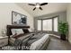 Serene main bedroom features a plush bed, neutral tones, and a cozy bay window at 10309 Georgetown Pl, Las Vegas, NV 89134