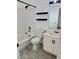 Clean bathroom with white tile, modern fixtures, and vanity with sink at 1320 Driscoll Dr # 202, Las Vegas, NV 89128