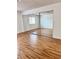 Bright bedroom with wood flooring and large mirrored closets at 1320 Driscoll Dr # 202, Las Vegas, NV 89128