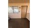 Inviting covered patio area with a front door and window providing natural light at 1320 Driscoll Dr # 202, Las Vegas, NV 89128
