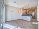 Bright dining area features modern lighting, wood floors, and access to the sliding glass door at 1510 Fieldbrook St, Henderson, NV 89052