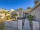 Single-story home with desert landscaping, gated entry, and neutral colors at 1510 Fieldbrook St, Henderson, NV 89052