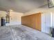 Spacious garage featuring wall to wall cabinets and epoxy flooring at 1510 Fieldbrook St, Henderson, NV 89052
