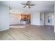 Open floorplan with wood floors connecting the kitchen, living room, and entry way at 1510 Fieldbrook St, Henderson, NV 89052