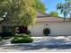 Charming home with a two-car garage, mature landscaping, and a meticulously maintained front yard at 1782 Castro Hill Ave, Henderson, NV 89012