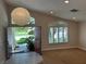 Bright living area with lots of natural light; view of the front yard through plantation shutters at 1782 Castro Hill Ave, Henderson, NV 89012