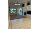 Bright living room with vaulted ceilings, fireplace, and sliding doors to outdoor space at 1782 Castro Hill Ave, Henderson, NV 89012