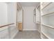 Spacious walk-in closet with custom shelving and ample storage space at 1816 Mazzanti Way, Henderson, NV 89014