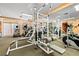 Well equipped gym with various machines, mirrors and lights at 1830 N Buffalo Dr # 2014, Las Vegas, NV 89128