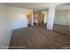 Bright main bedroom features neutral carpet, mirrored closet doors, and ensuite bathroom at 1850 Camino Verde Ln, Las Vegas, NV 89119