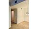 Dining room features overhead lighting, neutral paint, and doorway to the kitchen at 2121 Hussium Hills St # 107, Las Vegas, NV 89108