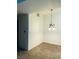 The dining room has overhead lighting and neutral paint at 2121 Hussium Hills St # 107, Las Vegas, NV 89108