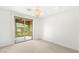 Bright bedroom featuring a balcony with wrought iron railings and a stylish chandelier at 2240 Boutique Ave, Henderson, NV 89044