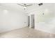 Well-lit bedroom with sleek wood floors and modern ceiling fan at 2240 Boutique Ave, Henderson, NV 89044