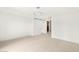Neutral bedroom offers a minimalist aesthetic and plenty of open space at 2240 Boutique Ave, Henderson, NV 89044
