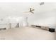 Spacious bonus room with ceiling fan, built-in media center, and neutral carpeting at 2240 Boutique Ave, Henderson, NV 89044