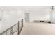Upstairs bonus room features neutral carpet, a modern media center, and plenty of natural light at 2240 Boutique Ave, Henderson, NV 89044