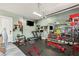 Bright, modern home gym with weights, benches, and treadmill at 2240 Boutique Ave, Henderson, NV 89044