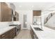 This contemporary kitchen offers sleek countertops, stainless steel appliances, and generous cabinet space at 2240 Boutique Ave, Henderson, NV 89044