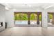 Bright, open living space features tile floors and seamless access to the covered patio and private pool at 2240 Boutique Ave, Henderson, NV 89044