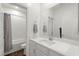 Modern bathroom showcasing a sink vanity and a partial view of the shower/tub at 25 Barbara Ln # 36, Las Vegas, NV 89183