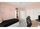 Bedroom featuring a workspace, bed, and closet at 25 Barbara Ln # 36, Las Vegas, NV 89183
