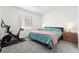 Comfortable bedroom with a large window, plush carpet, neutral-toned walls, and a modern ceiling fan at 25 Barbara Ln # 36, Las Vegas, NV 89183