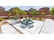 Community space with picnic tables and grills, perfect for outdoor gatherings and relaxation at 25 Barbara Ln # 36, Las Vegas, NV 89183