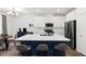 Modern kitchen featuring stainless steel appliances, a central island, and stylish lighting at 25 Barbara Ln # 36, Las Vegas, NV 89183