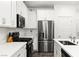 Stylish kitchen featuring stainless steel appliances and modern white cabinets at 25 Barbara Ln # 36, Las Vegas, NV 89183