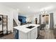 Open-concept kitchen flows to the living room and dining area at 25 Barbara Ln # 36, Las Vegas, NV 89183