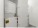 Convenient laundry area features a stacked washer and dryer, maximizing space and efficiency at 25 Barbara Ln # 36, Las Vegas, NV 89183