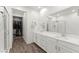 Spacious main bathroom with double sinks, large mirror, and walk-in closet at 25 Barbara Ln # 36, Las Vegas, NV 89183