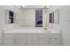 Bathroom features a large mirror and a vanity with ample storage at 2706 Colanthe Ave, Las Vegas, NV 89102