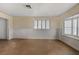 Bedroom features neutral walls, shuttered windows, and tile flooring at 2706 Colanthe Ave, Las Vegas, NV 89102