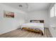 Bedroom features neutral walls, plank flooring, and natural light at 2706 Colanthe Ave, Las Vegas, NV 89102