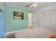 Bedroom features neutral walls, plank flooring, and closet storage at 2706 Colanthe Ave, Las Vegas, NV 89102