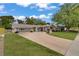 Traditional-style home with well-manicured lawn and spacious driveway at 2706 Colanthe Ave, Las Vegas, NV 89102