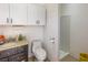 This practical bathroom features modern fixtures, white cabinets, neutral tones, and a separate shower area at 271 E Shelbourne Ave, Las Vegas, NV 89123