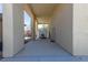 Long covered patio featuring backyard access, offering shade and space for outdoor living and storage at 271 E Shelbourne Ave, Las Vegas, NV 89123